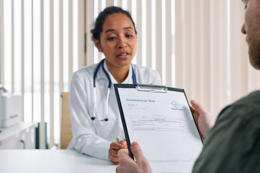 A Man Looking his Coronavirus Test Result